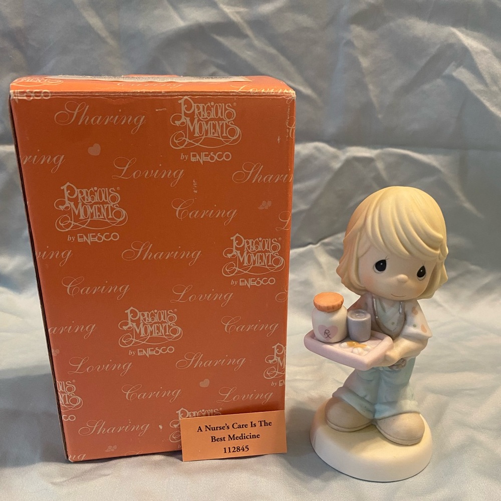 Precious Moments Figurine 2005 “A nurses care is the best medicine”